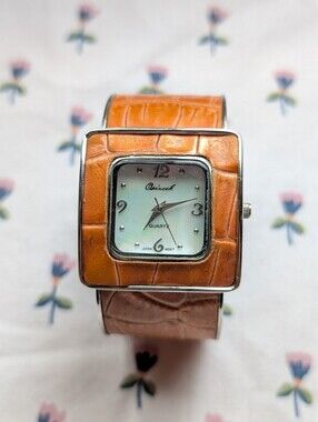 vintage retro 90s Osirock orange tanned leather silver analog cuff wrist watch